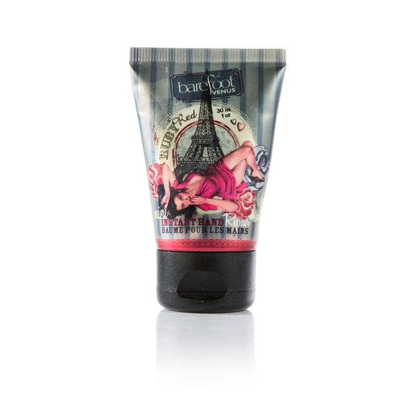 Ruby Red grapefruit hand cream tube with artistic design with Eiffel tower on a white background