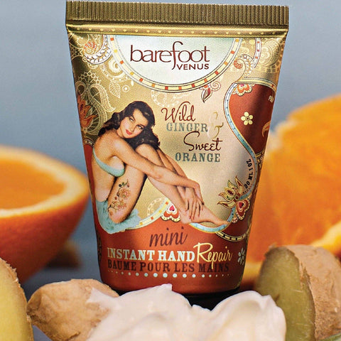 Barefoot Venus hand cream tube with oranges and ginger in the background