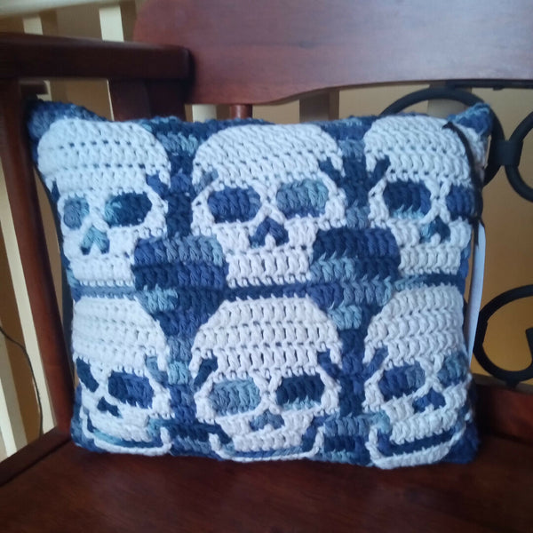 Skull and coffin pillow