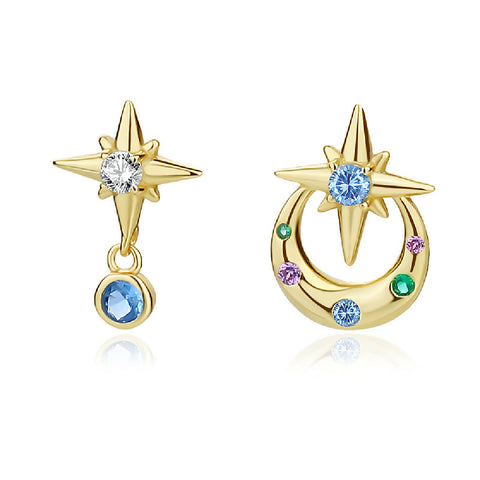 Gold star and moon earrings with colorful gemstones on a white background