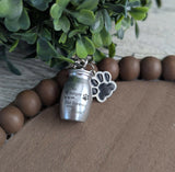 Silver Metal Urn with black paw 