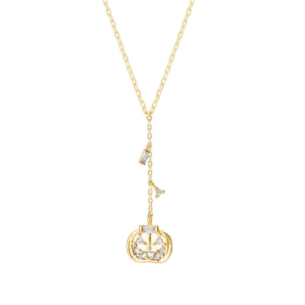 Gold necklace with a pumpkin jack-o-lantern on a white background